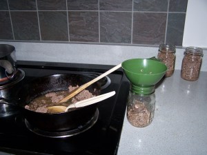 Loading the hot jars with yummy burger.